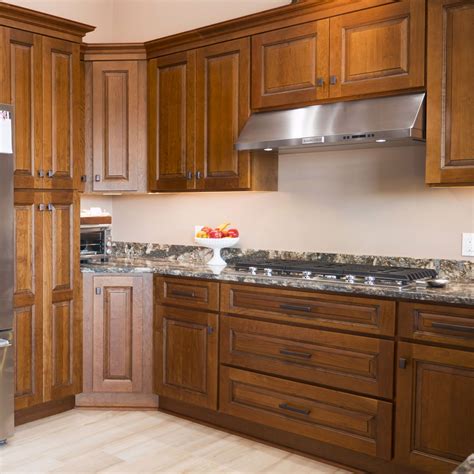 kitchens with stainless steel appliances cinnamon cabinets|cinnamon stained cabinets.